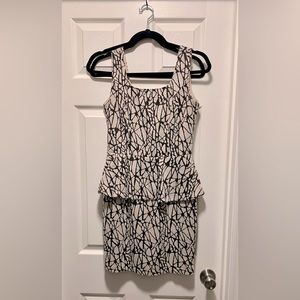 Cream and black peplum dress. On the short side. Size medium